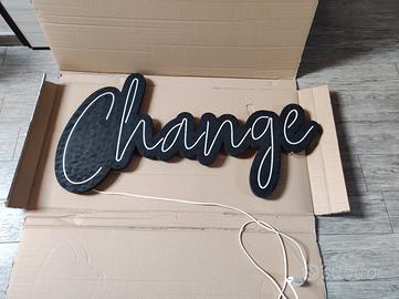 Insegna da parete luce led con scritta Change