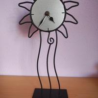 orologio di design in ferro a forma di Sole 