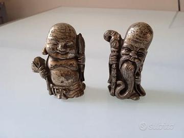 Coppia Statuine Orientali Laminate Argento