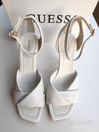 Titolo: Sandali Guess bianchi con tacco 