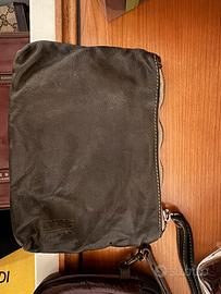 Pochette e portafoglio in pelle