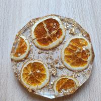 Piatto decorativo con fette di arance essiccate 