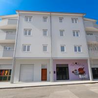 Nuovo trivano in quartiere residenziale