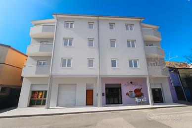 Nuovo trivano in quartiere residenziale