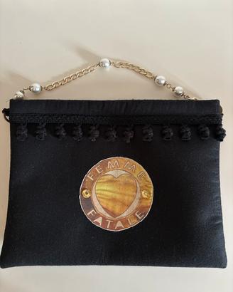 Pochette con tracolla corta