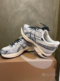 Asics e New Balance 2000