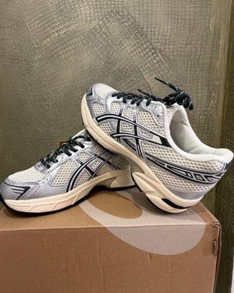 Asics e New Balance 2000