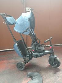 Triciclo-passeggino multifunzione 