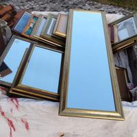 Specchi e cornici dorate