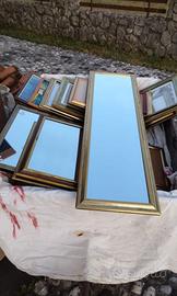 Specchi e cornici dorate