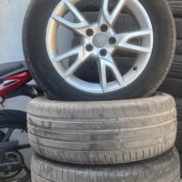 Cerchi in lega compreso gomme seminuove