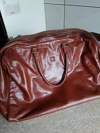 Borsone da viaggio in pelle.