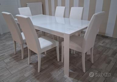 tavolo con vetro più 6 sedie in pelle come nuovi 