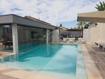 Villa con piscina +Villa hotel e SPA ben avviato