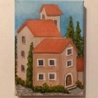 Un piccolo dipinto con delle case.