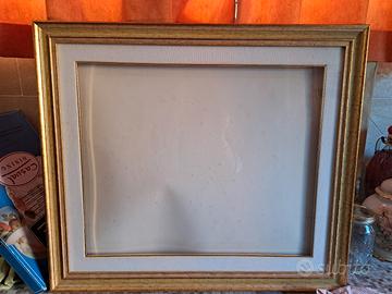 Cornice per quadri colore oro con vetro