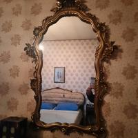 speccio con cornice in legno