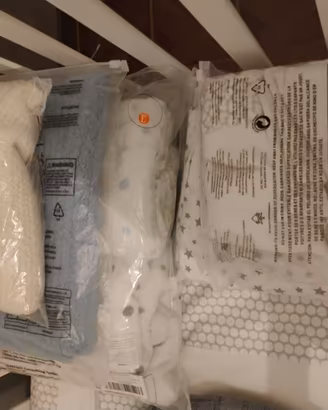 Coperte, lenzuola, cuscini antisoffoco, paracolpi