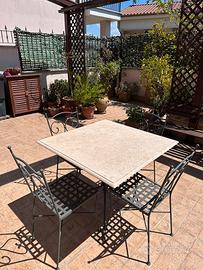 Tavolo in ferro battuto piano travertino  4 sedie