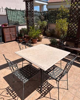 Tavolo in ferro battuto piano travertino  4 sedie