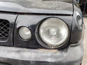 Proiettore sinistro NISSAN TERRANO II del 1997