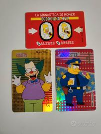 tre carte dei Simpson Kristy, Winchester e Homer