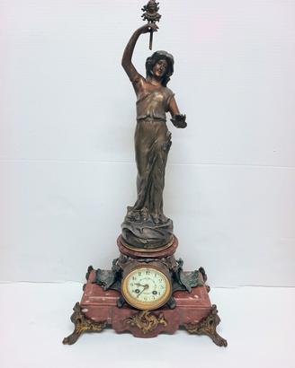 Scultura con orologio e base marmo