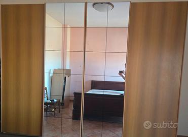 Armadio a 6 ante: 330x250x60 con specchio
