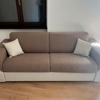 Divano letto con bracciolo sagomato