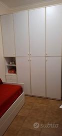armadio e letto a cicogna