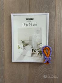 Cornice con mongolfiera piccola in tricotin