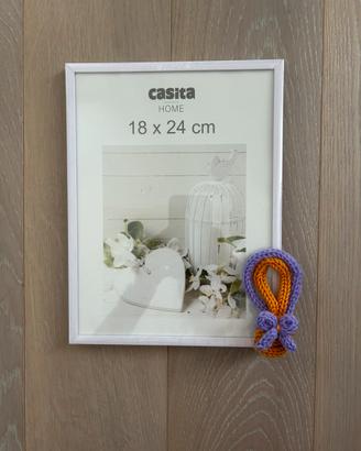 Cornice con mongolfiera piccola in tricotin