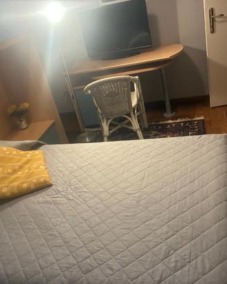 Camera singola con bagno condiviso