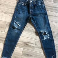 Jeans ragazzo strappati