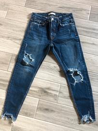 Jeans ragazzo strappati