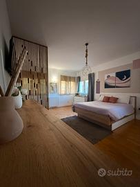 Camere eleganti con posto auto - Max 1 mese