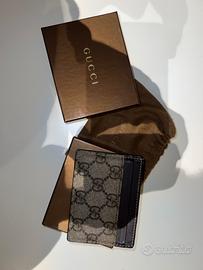 Portacarte Gucci in tessuto GG Supreme lucido