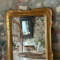 Specchiera d’epoca con cornice in legno  dorata