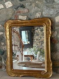 Specchiera d’epoca con cornice in legno  dorata