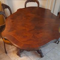 TAVOLO IN NOCE OVALE CON 6 POLTRONCINE