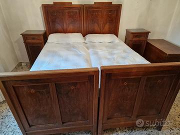 Camera da letto completa con intarsi.