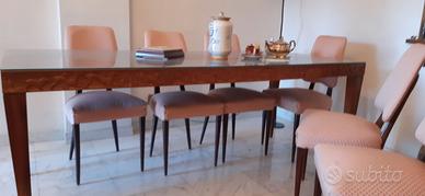 Tavolo in palissandro . Mobilificio Cantù.