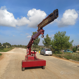 Gru semovente più braccio telescopico