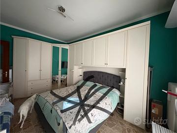 Camera da letto con cabina armadio