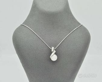 Collana in oro bianco con perla e diamanti