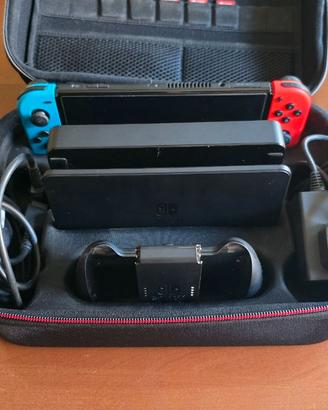 Switch oled + giochi e custodia