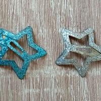 Mollette a forma di stella con brillantini