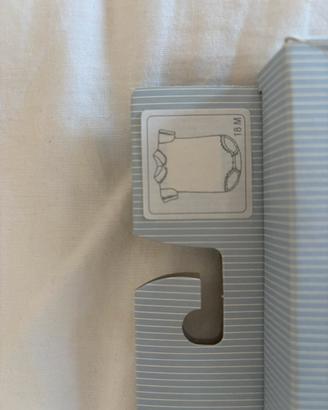 Raffinato elegante body neonato