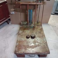 bilancia basculante con pesi 