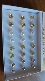 60 paia di orecchini silver  gold